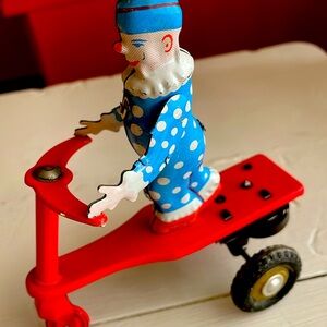 Vintage Tin Roli Zoli Wind Up Toy Clown On Red Scooter –